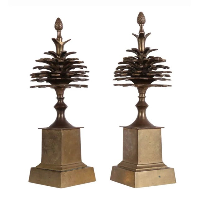 This elegant pair of vintage Maison Charles brass garnitures, standing at an impressive 17 inches tall, showcases the...