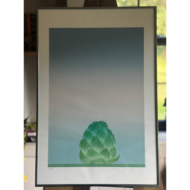 Elevate your space with this striking, minimalist 1984 color lithograph by celebrated Japanese-American artist Shunji...