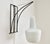Modernist wall sconce made from black painted wire metal and a satined milk glass lampshade. Likely designed by Louis...