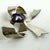 This 1940s statement brooch is made in sterling silver with a large, faceted amethyst set in the center. Made by Taxco,...