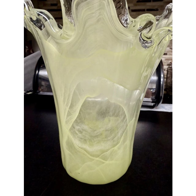 Stunning vintage Murano, Italy art glass vase featuring a vibrant yellow swirl design and beautifully sculptural freeform...