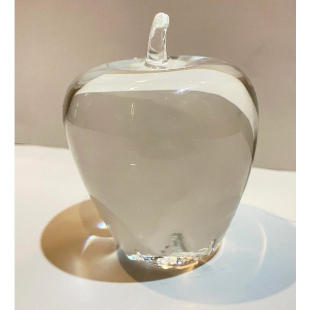 A crystal apple figure by Steuben Glass, often used as a paperweight. Originally designed by Angus McDougall in 1940, this...