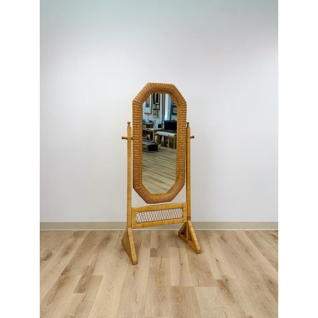 This vintage wicker floor mirror brings an easy, coastal sensibility to any room with its distinctive hexagon silhouette...