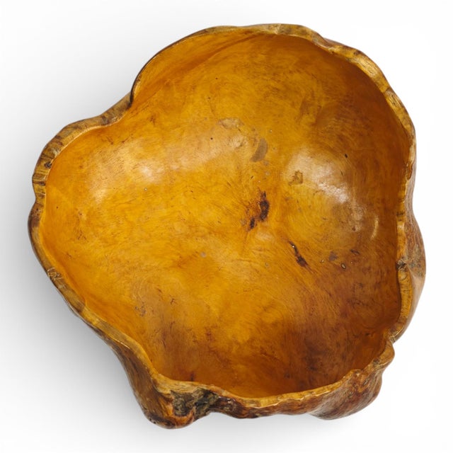 This sculptural hand-carved birch burl bowl is a striking example of mid-century Scandinavian craftsmanship, where nature...