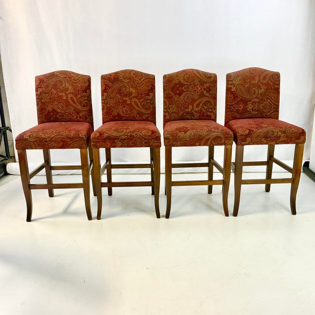 This is a set of 4 lovely Upholstered Bar Stools in a Regency Empire style. They are covered in an Italian Cotton...