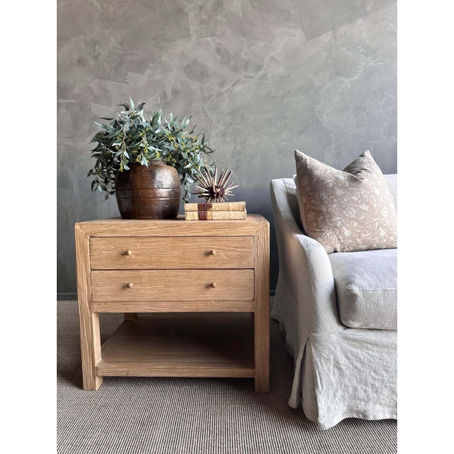 Presenting the Nathalie Nightstand, made from sturdy reclaimed elm wood with a lovely natural finish and wax coating. This...