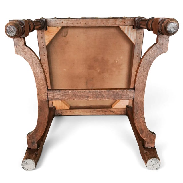 This set of 10 Antique French Renaissance Revival Chairs features beautifully embossed leather upholstery and intricate...