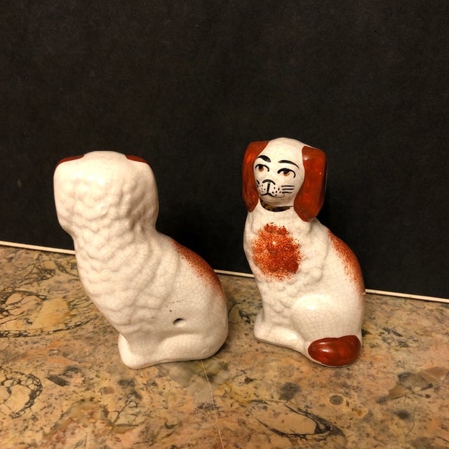 A wee pair of English Staffordshire Handpainted King Charles spaniels. Miniature Dogs figures. Copper Lustre collars. Dark...