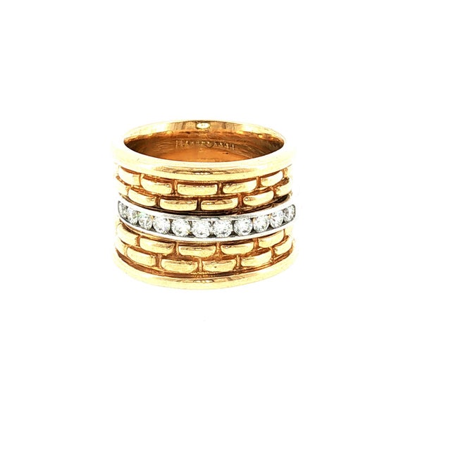 A pair of late 20th-century 18k yellow gold stackable guard rings (photos show them stacked with a diamond wedding ring...