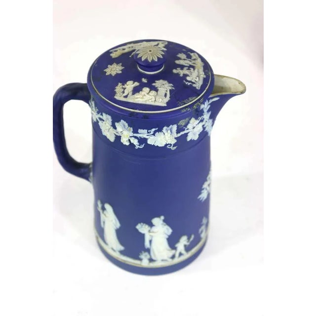 A fine collection of 1890-1910 Wedgewood Jasperware blue (one celadon green, not included)Two biscuit barrels with silver...