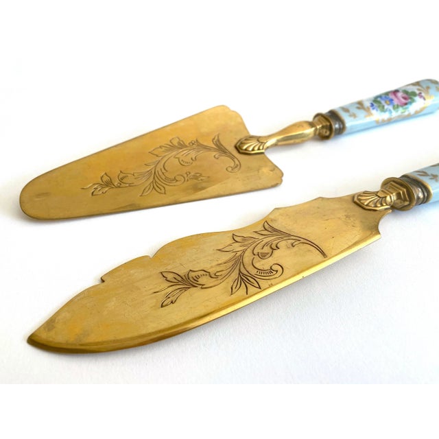 Various Artists Antique Early 1900's Neoclassical Hand Painted Floral Gilded Porcelain Brass Fish Serving Utensils - Set of 2 For Sale - Image 4 of 13