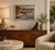 Beautiful modern oil painting on board depicting a dramatic rocky coastline with rolling ocean waves. The artist uses...