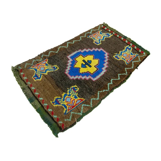 Vintage Handknotted decorative mini rug from Kars region of Turkey. Approximately 45-55 years old. In very good condition.