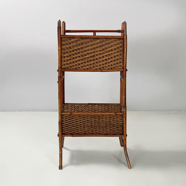 Italian mid-century modern Magazine rack with double shelf in rattan, 1960s Floor magazine rack with double rectangular...