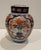Antique Chinese porcelain ginger jar with Imari floral decoration in orange and blue with gilt. There are flowers in a...
