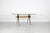 This Italian dining table was designed by Carlo Ratti in the 1950s. The table and the chairs in Milan were manufactured by...