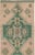 This mid-20th-century Turkish Anatolian long runner presents a striking procession of six large green medallions arranged...