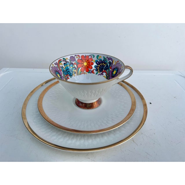 Dessert Place setting made of pure white porcelain with a gold rim all around. A wonderful relief of diamonds and dotted...