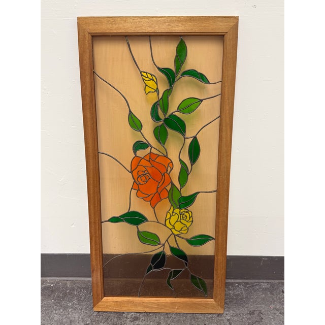 Design Plus Gallery presents a Vintage Framed Stained Glass Floral Panel Signed Tori. This vintage stained-glass panel...