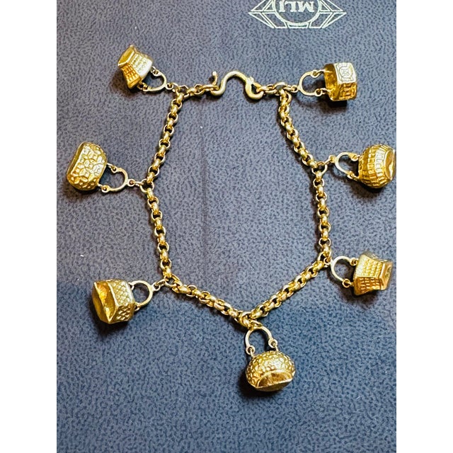 2010s 24 Karat Yellow Pure Gold 15.5 Gm Charm Bracelet with 7 Basket Charms For Sale - Image 5 of 18