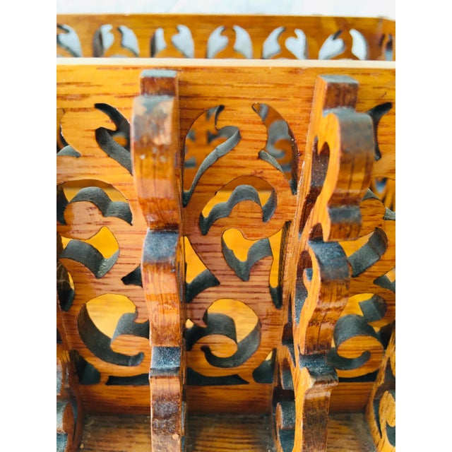 This is a 20th century hand carved fretwork oak dresser box. This art form is also known as tramp art. This beautiful oak...