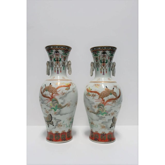 A very beautiful pair of polychromed Kutani porcelain Japanese vases, circa early 20th Century, Meiji period, Japan. Vases...