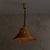 Woven rattan defines the body of this 1970s French pendant, shaped within a bentwood frame that brings structure to an...