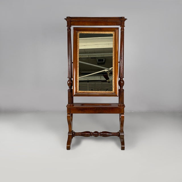 Italian Empire style self-supporting floor mirror in wood, 1850s Full-length and self-supporting floor mirror in wood. The...
