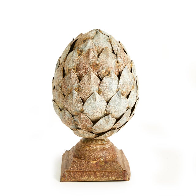 Constructed out of iron and galvanized metal, this oversized artichoke finial adds texture and depth. A great way to bring...