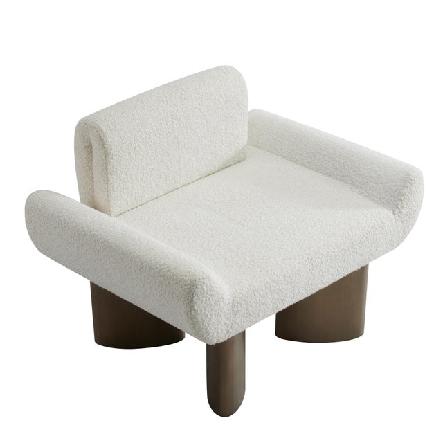 A modern unique, statement accent chair that is comfortable and chic at the same time. It almost gives you a hug when you...
