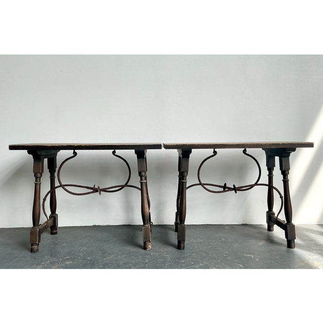 This exceptional pair of 19th-century side tables captures the rugged elegance of Spanish Colonial design. Each table...