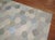 A Swedish influenced handmade room size Turkish Kilim from the late 20th century. Accents in white, blue and gray....