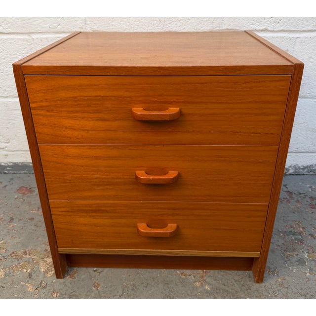 Vintage mid-century modern teak three-drawer nightstand. Please confirm location (Brooklyn or NJ)