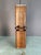 Gorgeous real wood grain. Rounded Sculptural wood blocks on lifted pegs. Silver accents in the base, lid and stem. Corded...