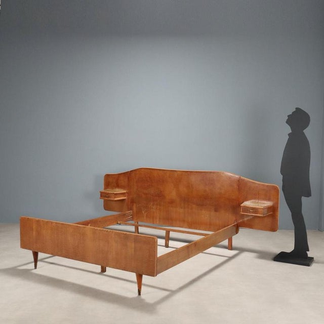 Vintage double bed with maple burl veneer, two small bedside tables built into the headboard with glass tops. Brass...