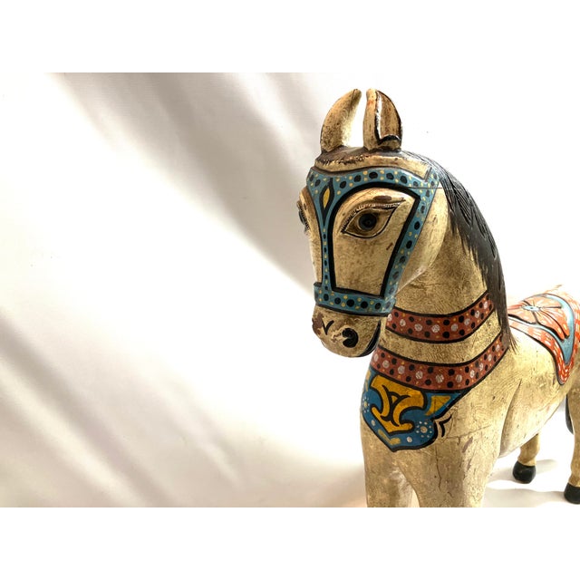 Horses make everything more beautiful! Let our carved child-sized carousel horse be a colorful accent in your home. Sure...