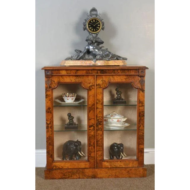 French clock mantle clock Le Premier Miroit signed Francois Moreau, the circular Roman numeric shell capped dial, raised...