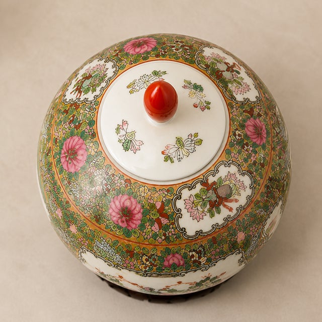 Bring timeless elegance to any interior with this beautifully decorated Chinese Famille Rose porcelain ginger jar....
