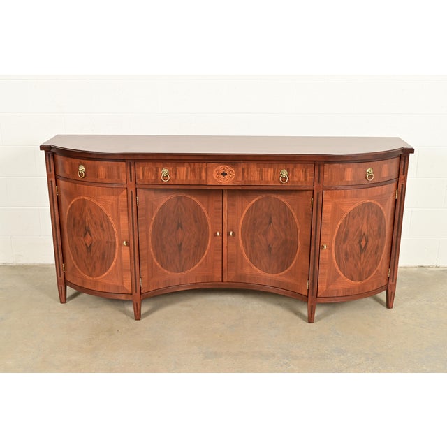 An exceptional Neoclassical, Regency, or Louis XVI style bow front sideboard buffet, credenza, or bar cabinet By John...