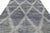 This handcrafted wool rug blends traditional Berber weaving with a contemporary style. Its large diamond pattern in slate...