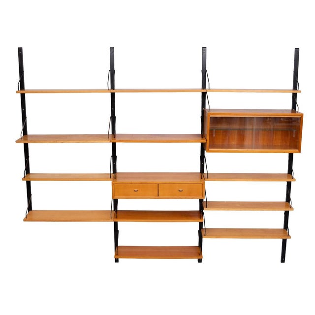 Iconic Royal System by Poul Cadovius 1950s Iin the rare African Bonkonko Wood beautiful warm light color, 4 uprights 2...