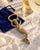 Decorative late-20th-century solid-brass bottle opener handcrafted in India in the form of a sculptural mermaid. The...