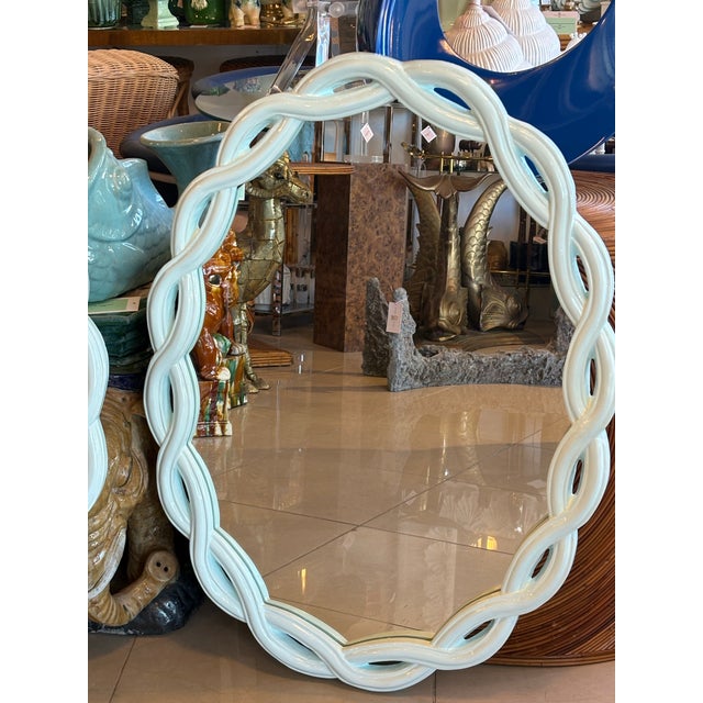 Vintage pair of 1970s, newly lacquered light aqua oval scalloped looping wall mirrors. Being sold as a pair. New wire,...