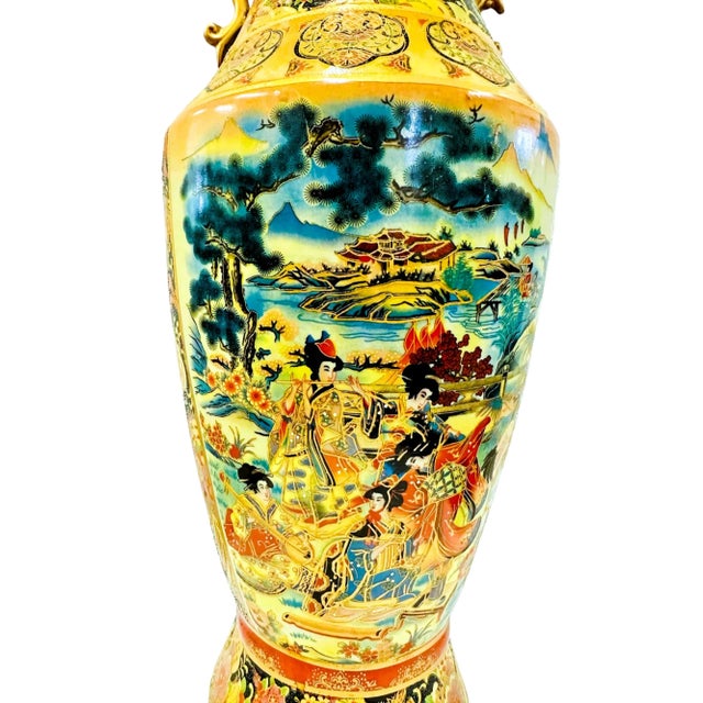 Vintage Japanese Satsuma Fluted Urn With Scroll Handles. Colorful design with raised enamel, glazed slipware or 'moriage',...