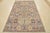 This traditional tribal geometric Caucasian rug is hand-knotted with an all-wool pile on a cotton foundation. This rug is...