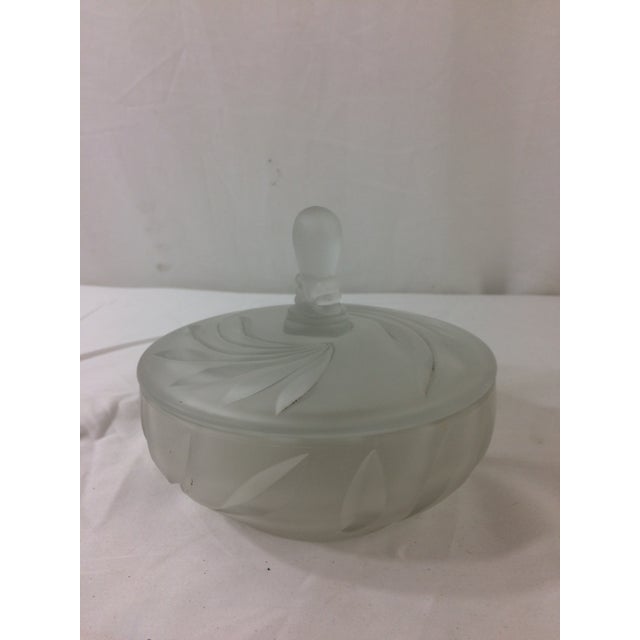This pressed glass dish is a real treasure. Pressed in three parts, it has a wonderful art deco design and would be a...