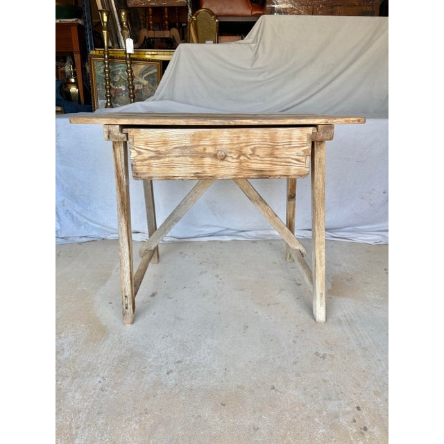 This Late 19th Century Spanish Baroque Style Side Table was crafted from old growth pine in the late 1800's. The piece...