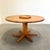 Remarks: Unique mid century round dining table, 1970s. Made of solid line wood. Rotatable centre disk. Table is good...