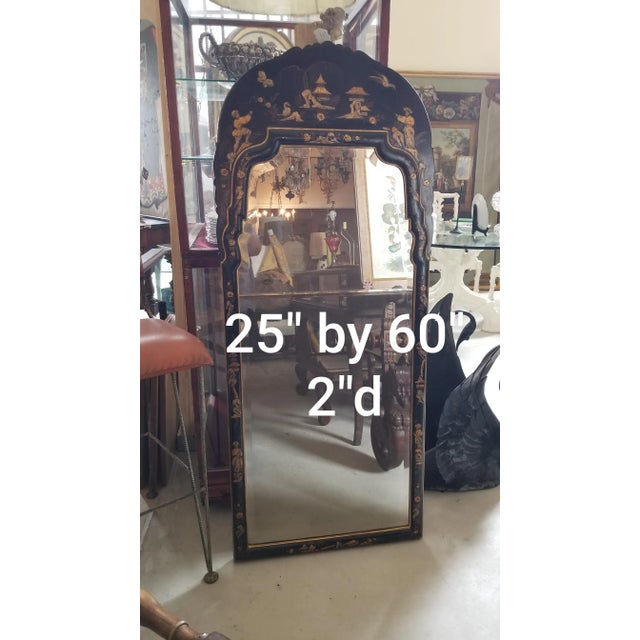 Beautiful antique style Chinoiserie decorated queen Anne mirror with two artificially aged mirror panels.