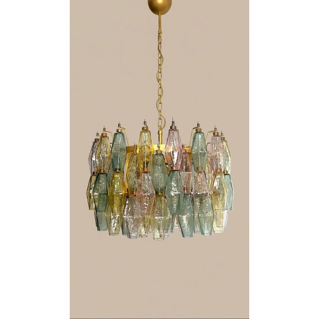 DUTIES FREE A spectacular late 20th-century Italian Murano glass chandelier featuring 71 individually handcrafted poliedri...